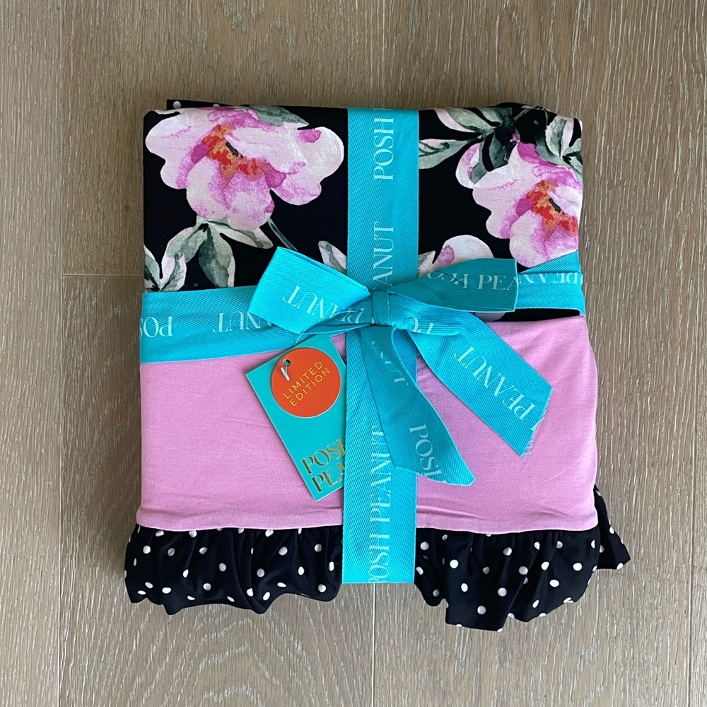 Posh peanut ruffled reversible blanket
